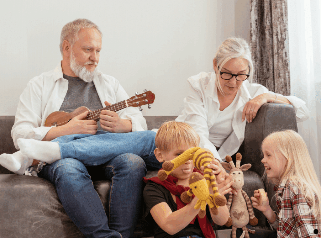 A family enjoys time together on a couch, happily playing a ukulele.